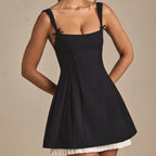 Black pleated A line mini skirt